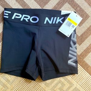 NWT Women Nike Pro short black white logo size S 3”